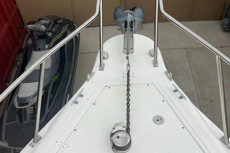 Slide: The Image of Bow of a 2000 Baha Cruisers 272 Sportfish with anchor and chain. - 14