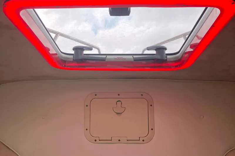 Slide: The Image of Cabin hatch view inside 2000 Baha Cruisers 272 Sportfish boat. - 32