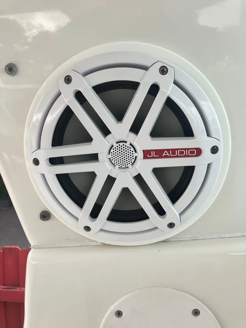 Slide: The Image of JL Audio speaker on a 2000 Baha Cruisers 272 Sportfish boat. - 27