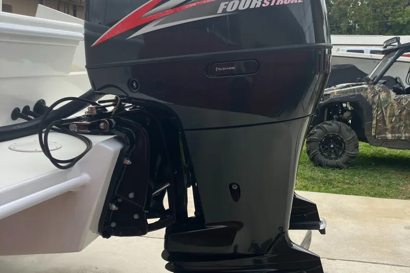 Slide: The Image of Outboard motor of a 2000 Baha Cruisers 272 Sportfish boat. - 13