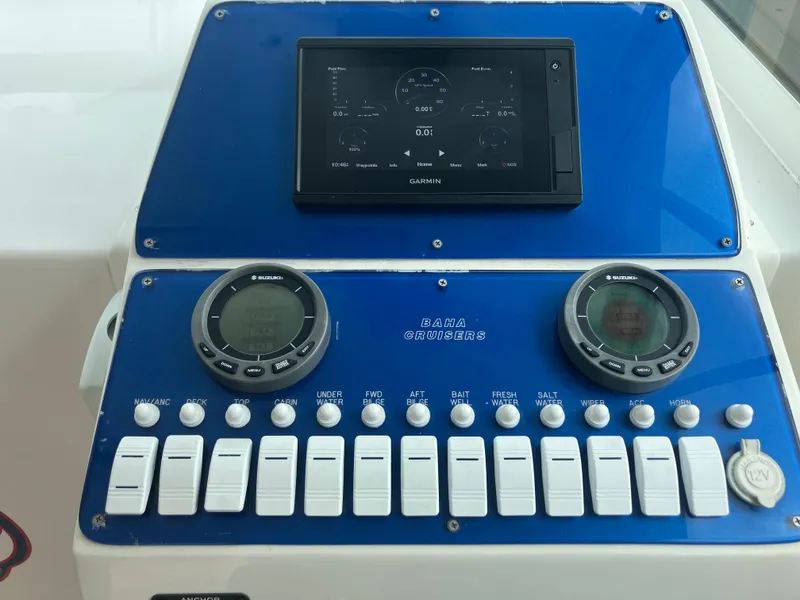 Slide: The Image of Control panel of a 2000 Baha Cruisers 272 Sportfish boat with Garmin display. - 19
