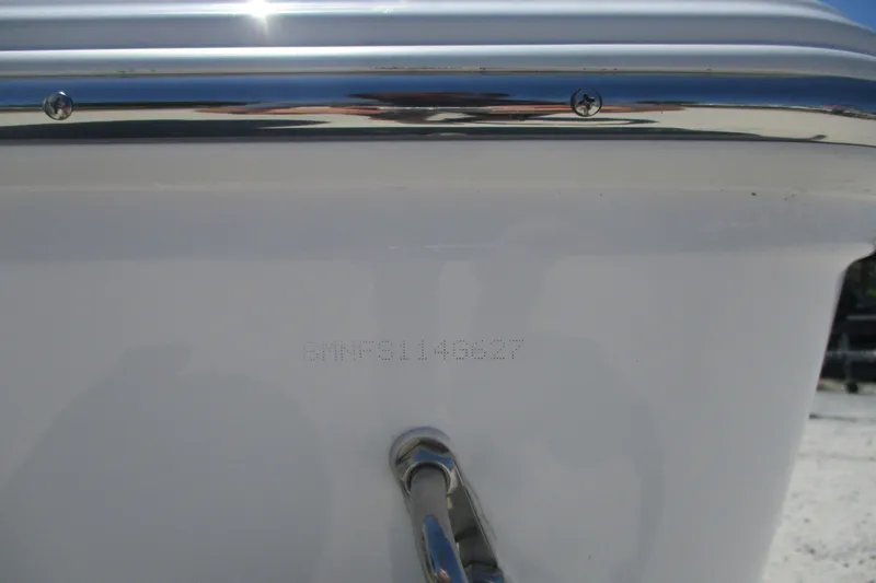 Slide: The Image of 2027 Sportsman Open 232 Center Console boat hull with visible serial number. - 15