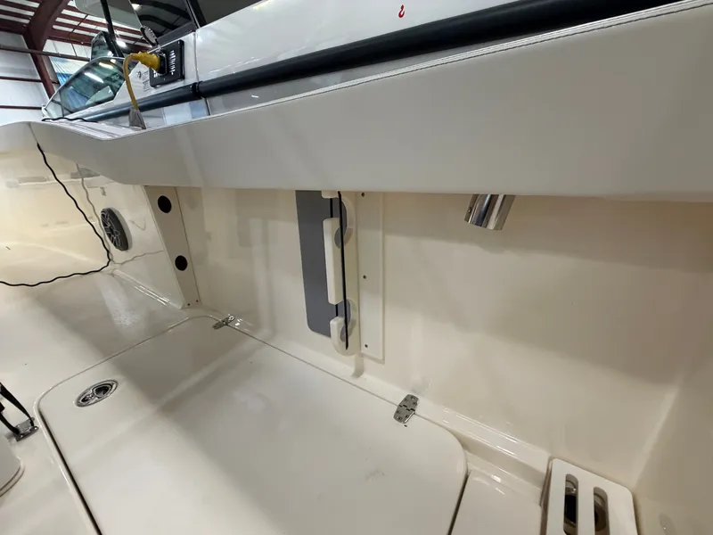 Slide: The Image of The image shows the deck of a 2027 Scout 260 LXF boat with a clean, modern design. - 25