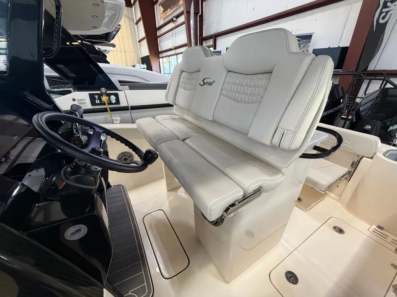 Slide: The Image of The 2027 Scout 260 LXF features an elegant, cushioned double seat in the cockpit area. - 29