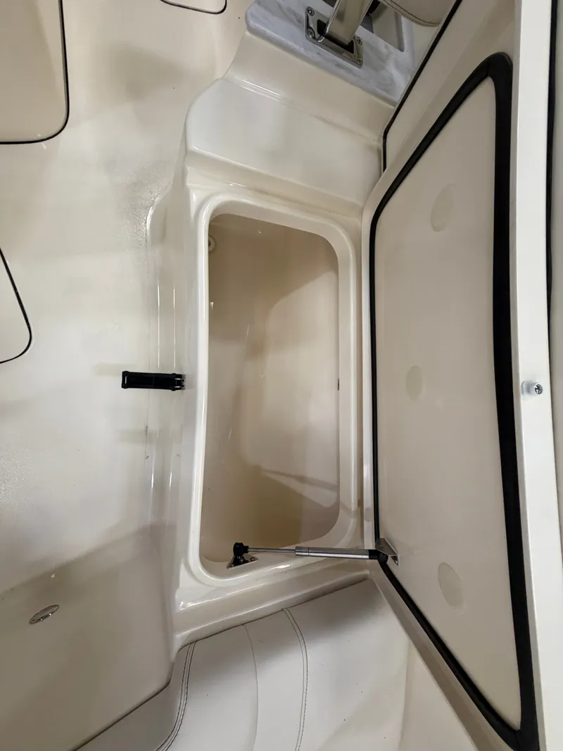 Slide: The Image of Interior view of a storage compartment on a Scout 260 LXF boat. - 41