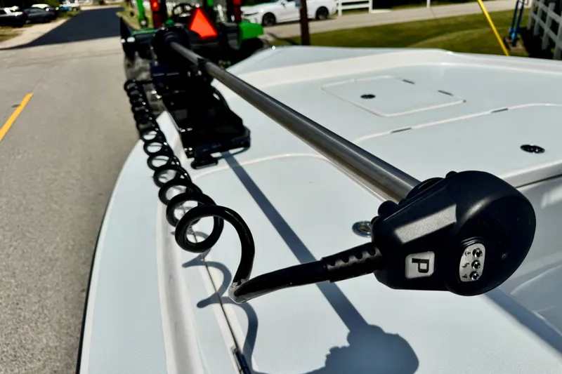 Slide: The Image of 2025 Shallow Sport 24 Modified V boat with advanced trolling motor on deck. - 17