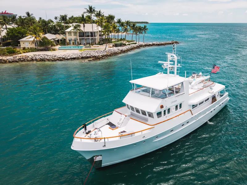 Slide: The Image of 1992 Palmer Johnson 80 VRIPACK DOGGERS BANK yacht near a tropical coastline. - 12