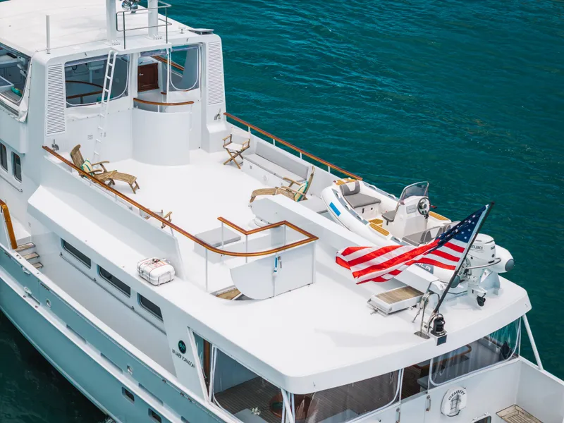 Slide: The Image of 1992 Palmer Johnson 80 VRIPACK DOGGERS BANK with spacious deck and American flag. - 6