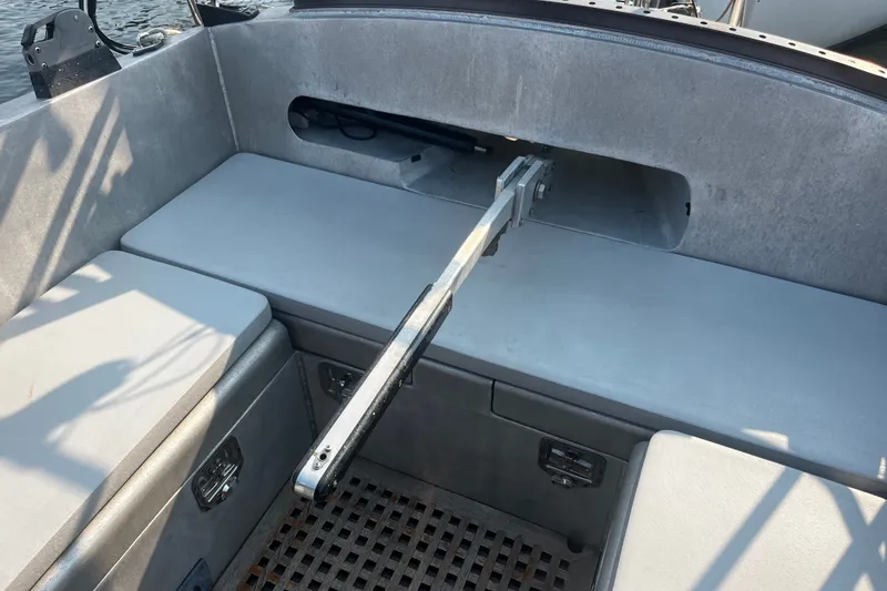 Slide: The Image of Interior of a 2005 Brewer Cutter boat with seating and storage compartments. - 55