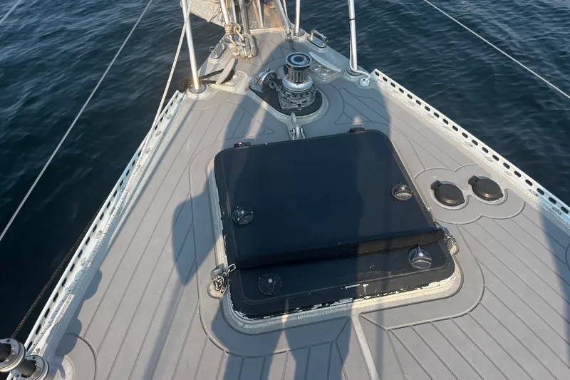 Slide: The Image of Bow of a 2005 Brewer Cutter sailboat with hatch and winch. - 39