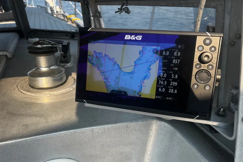 Slide: The Image of Navigation system on a 2005 Brewer Cutter sailboat displaying nautical charts. - 59