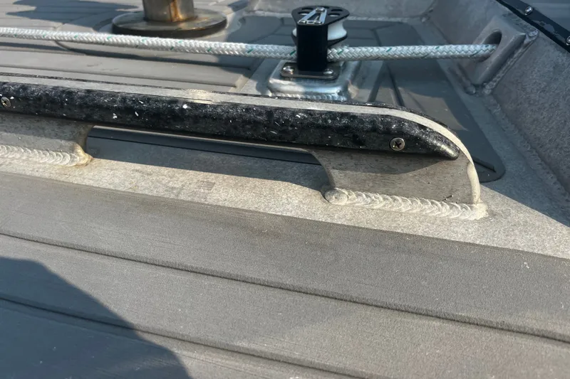 Slide: The Image of Close-up of a 2005 Brewer Cutter boat deck with rope and hardware. - 43