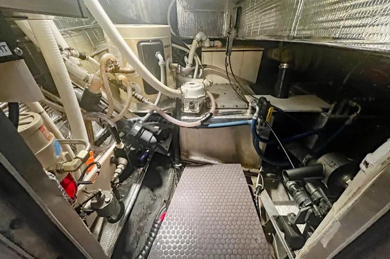 Slide: The Image of Engine room of a 2005 Brewer Cutter, showcasing complex piping and machinery. - 17
