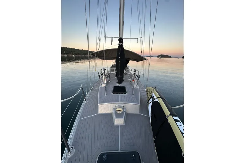 Slide: The Image of Sailboat deck at sunset, Brewer Cutter 2005, calm waters, scenic view. - 66