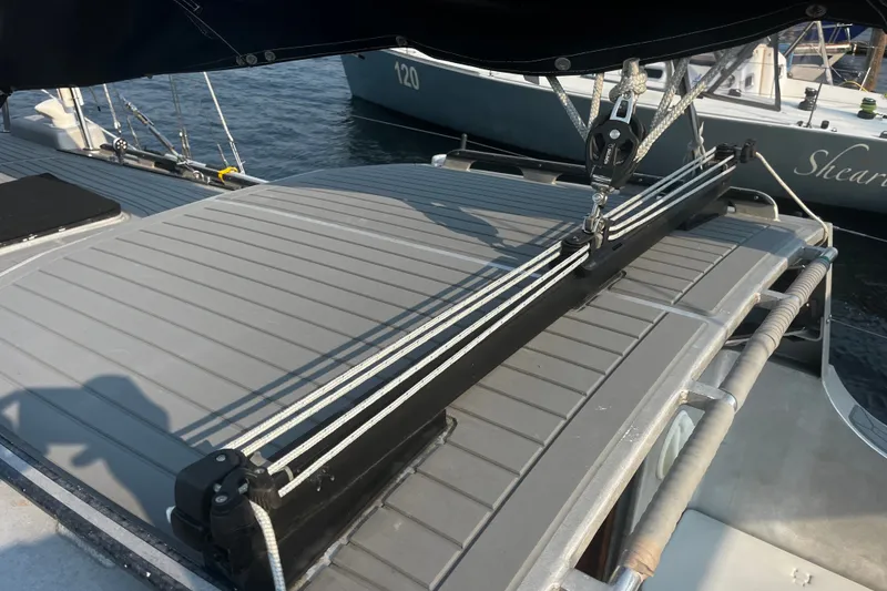 Slide: The Image of Sailboat deck with rigging, Brewer Cutter 2005 model, docked at marina. - 51
