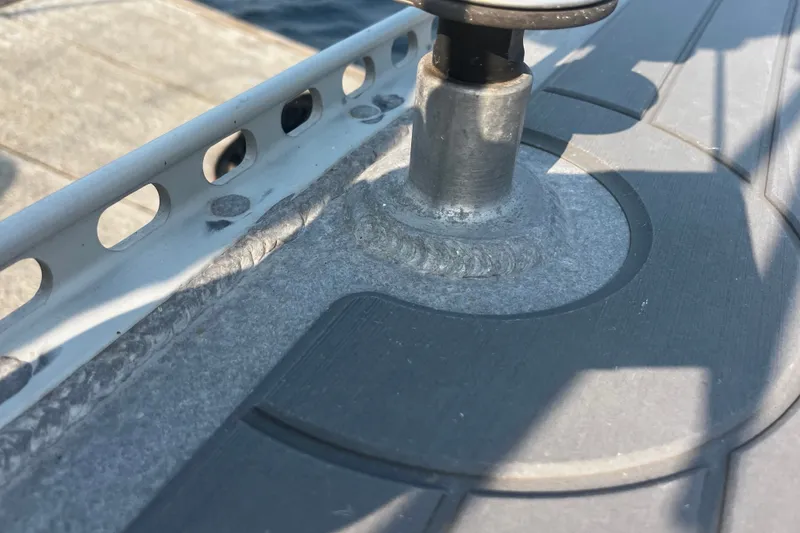 Slide: The Image of Close-up of a 2005 Brewer Cutter deck fitting with metal components. - 48