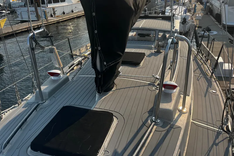 Slide: The Image of Sailboat deck view of 2005 Brewer Cutter, docked at marina. - 41