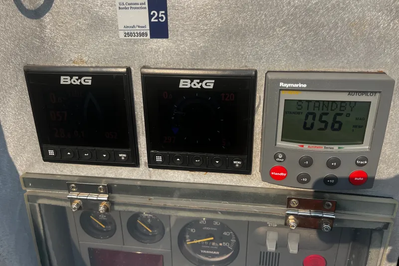 Slide: The Image of Control panel with B&G displays and Raymarine autopilot on a 2005 Brewer Cutter vessel. - 60