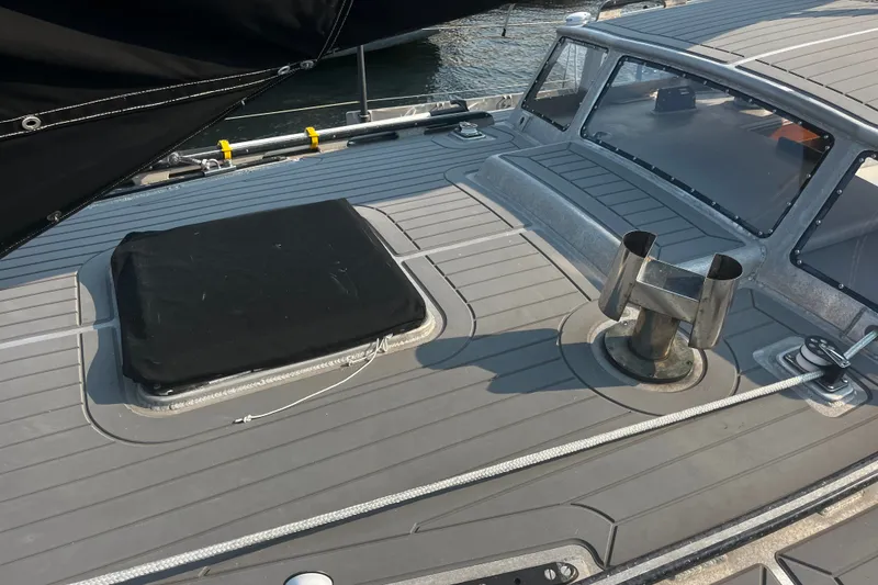 Slide: The Image of Deck of 2005 Brewer Cutter sailboat with hatch and winch. - 49