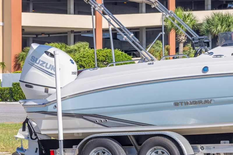 Slide: The Image of 2018 Stingray 192 SC boat with Suzuki 150 engine on trailer. - 9