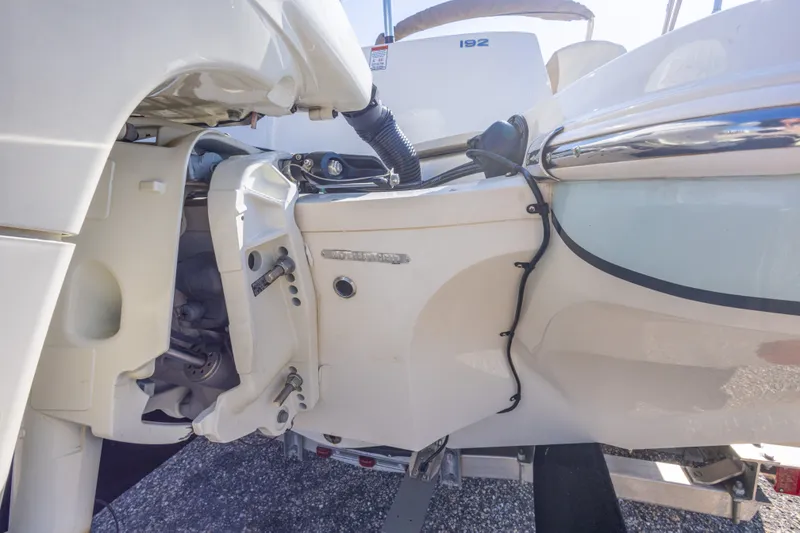 Slide: The Image of 2018 Stingray 192 SC boat engine and stern detail. - 15