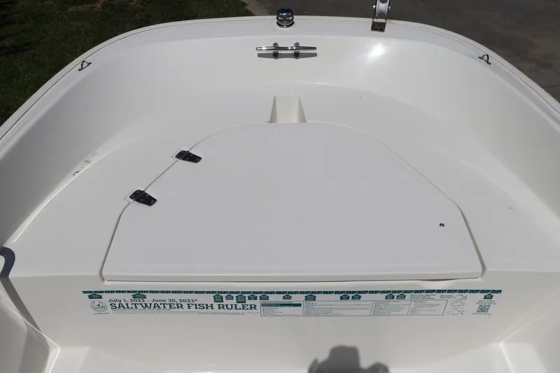 Slide: The Image of 2017 Boston Whaler 130 Super Sport boat interior with saltwater fish ruler. - 21