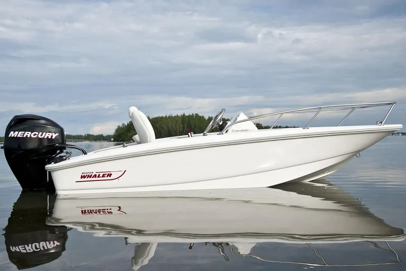 The Image of Manufacturer Provided Image: 2017 Boston Whaler 130 Super Sport boat on calm water. - 24