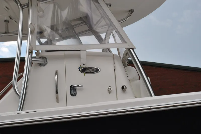 Slide: The Image of 2016 Regulator 28 Forward Seating boat console with stainless steel details. - 7