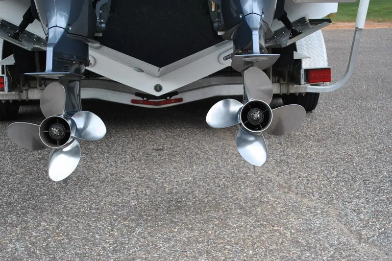 Slide: The Image of Twin propellers on a 2016 Regulator 28 Forward Seating boat. - 13