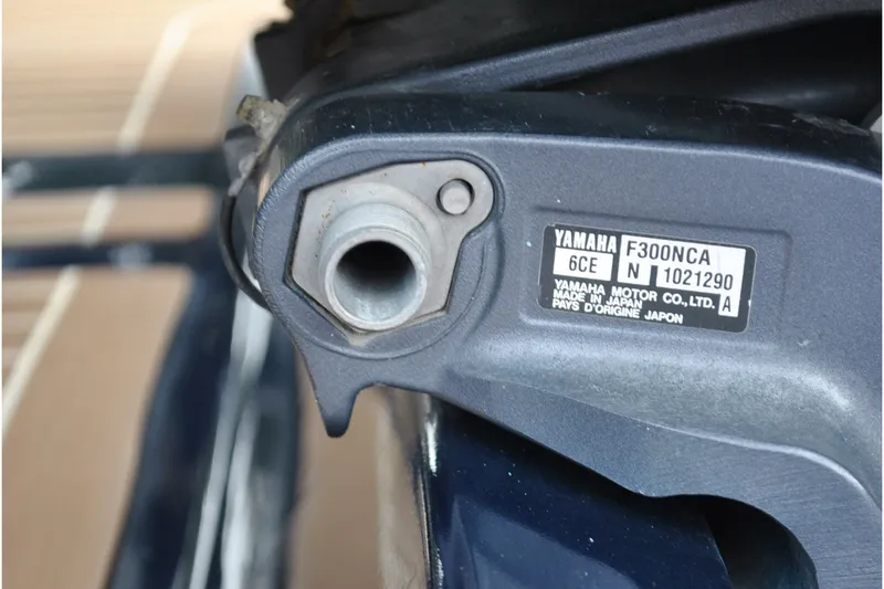 Slide: The Image of Close-up of Yamaha F300NCA engine part on 2016 Regulator 28 Forward Seating boat. - 14