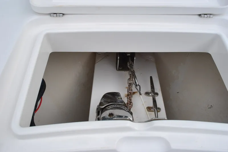Slide: The Image of Anchor storage compartment on a 2016 Regulator 28 Forward Seating boat. - 26