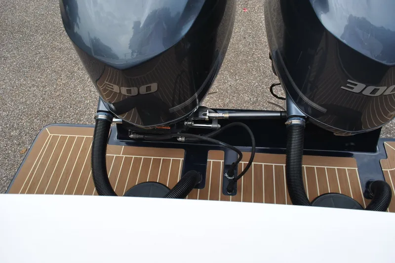 Slide: The Image of Twin 300 horsepower engines on 2016 Regulator 28 Forward Seating boat. - 34
