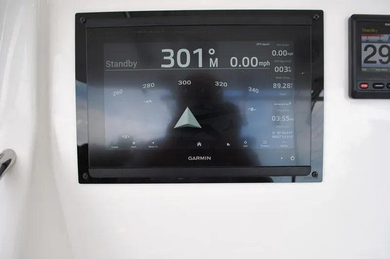 Slide: The Image of Garmin navigation display on 2016 Regulator 28 Forward Seating boat dashboard. - 22