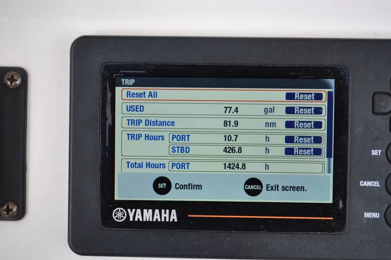 Slide: The Image of Yamaha trip display showing fuel usage and trip data on 2016 Regulator 28 Forward Seating. - 17