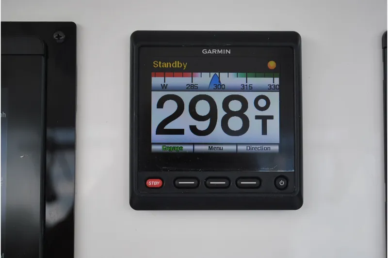 Slide: The Image of Garmin navigation display showing 298 degrees on a 2016 Regulator 28 Forward Seating boat. - 21