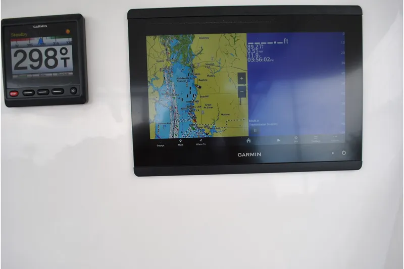 Slide: The Image of Garmin navigation displays on 2016 Regulator 28 Forward Seating boat dashboard. - 23