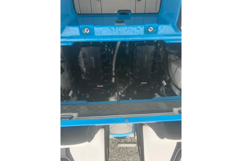 Slide: The Image of 2021 Yamaha Boats 255XE engine compartment with dual engines visible. - 17