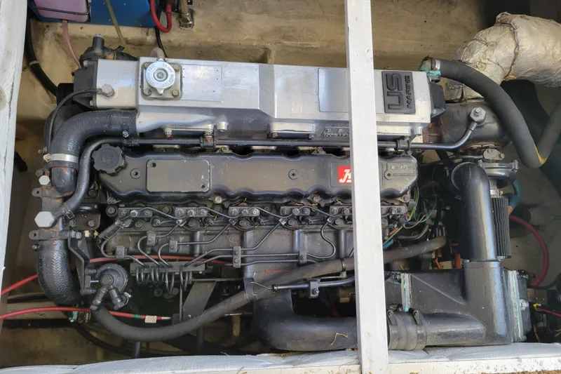 Slide: The Image of Engine of a 1991 Bayliner 4588 Pilothouse, showcasing intricate mechanical components. - 36