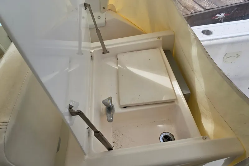 Slide: The Image of 2000 Tiara Yachts 3100 Open sink area with cover and faucet. - 8