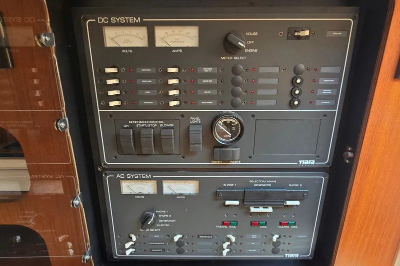 Slide: The Image of Electrical control panel on a 2000 Tiara Yachts 3100 Open boat. - 24