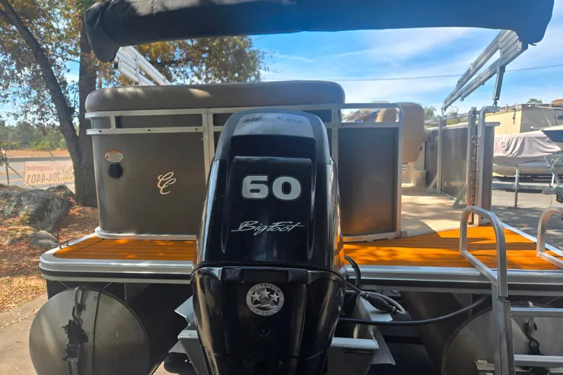 Slide: The Image of 2013 Cypress Cay Seabreeze 210 pontoon boat with a 60 horsepower BigFoot motor. - 14