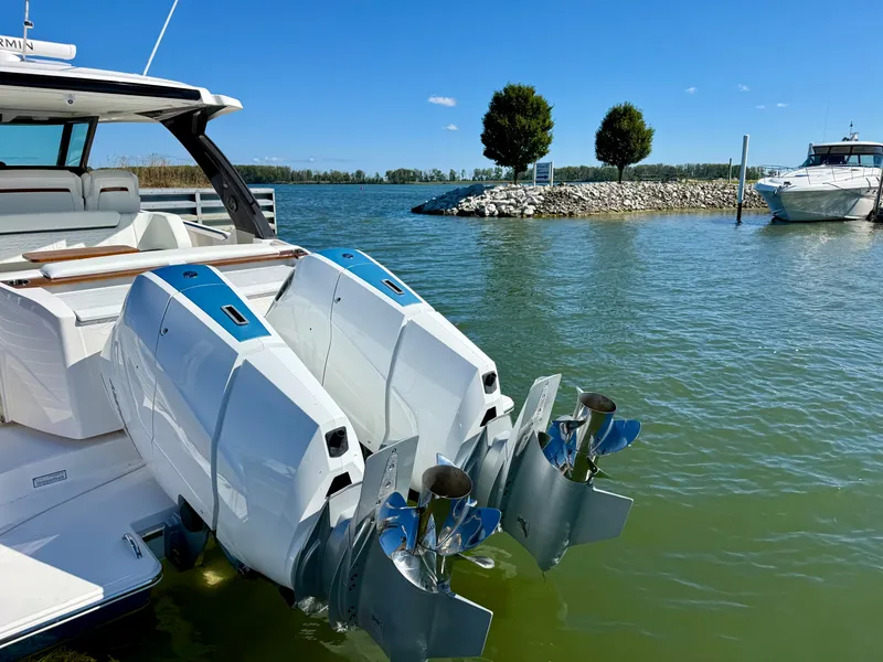 Slide: The Image of The image shows a 2027 Tiara Yachts 39LS boat with dual outboard engines in the water. - 4