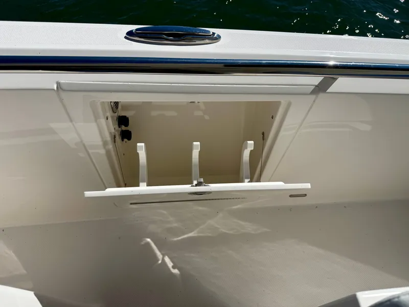 Slide: The Image of An open storage compartment on a 2027 Tiara Yachts 39LS boat. - 18