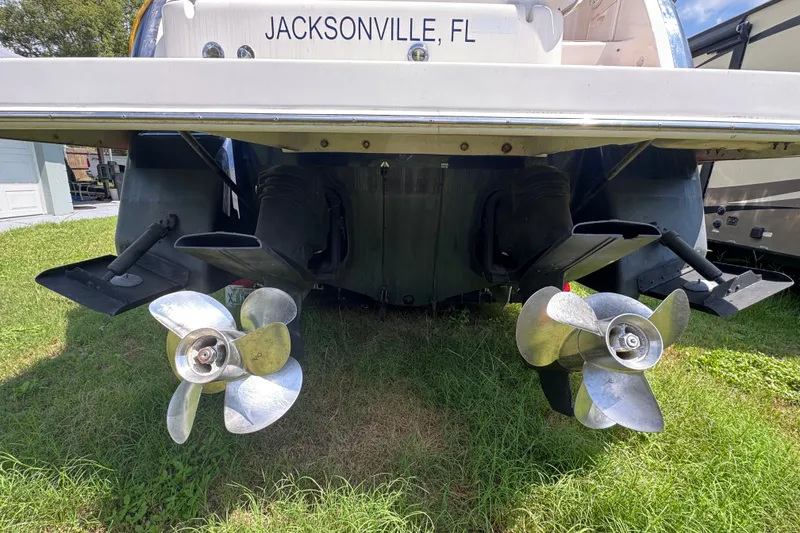 Slide: The Image of Rear view of a 2010 Regal 2860 Window Express boat with dual propellers. - 4