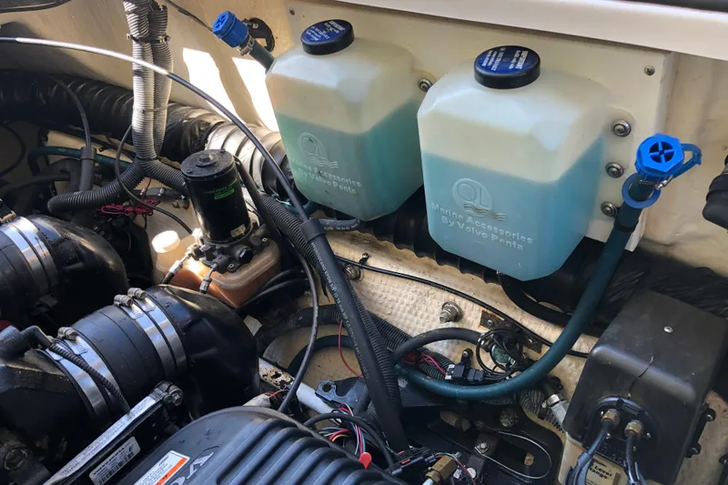 Slide: The Image of Engine compartment of a 2010 Regal 2860 Window Express with Volvo Penta marine accessories. - 21