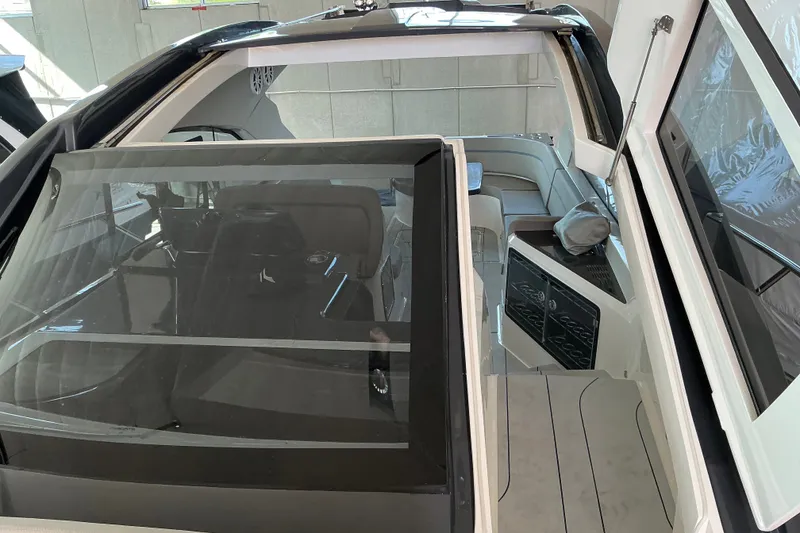 Slide: The Image of 2027 NX Boats 41 Horizon interior with sleek design and modern seating arrangement. - 19