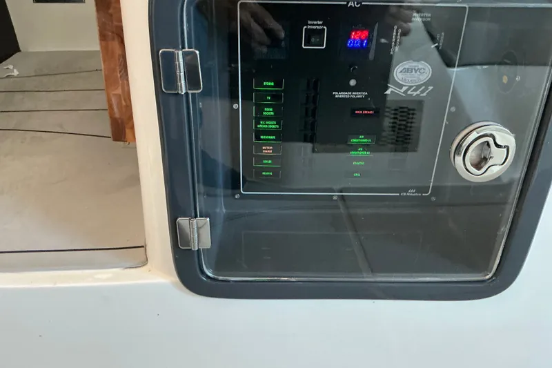 Slide: The Image of Electrical control panel on 2027 NX Boats 41 Horizon, featuring various switches and indicators. - 24