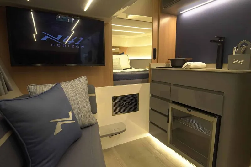 Slide: The Image of Manufacturer Provided Image: Interior of 2025 NX Boats 41 Horizon, featuring modern design and comfortable seating. - 6