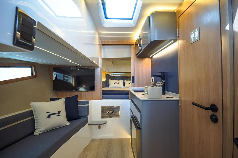 Slide: The Image of Manufacturer Provided Image: Luxurious interior of 2025 NX Boats 41 Horizon, featuring modern design and comfortable seating. - 4