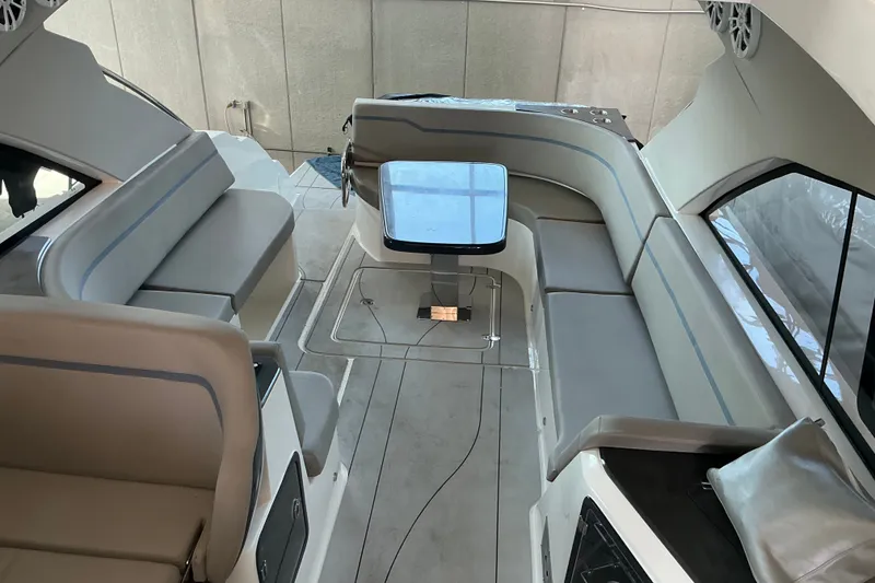 Slide: The Image of Luxurious interior of 2027 NX Boats 41 Horizon with elegant seating and modern design. - 16
